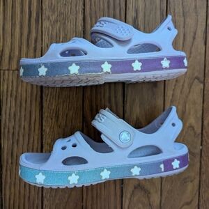 GUC lavender lilac Crocs sandals with Velcro strap and star pattern at base